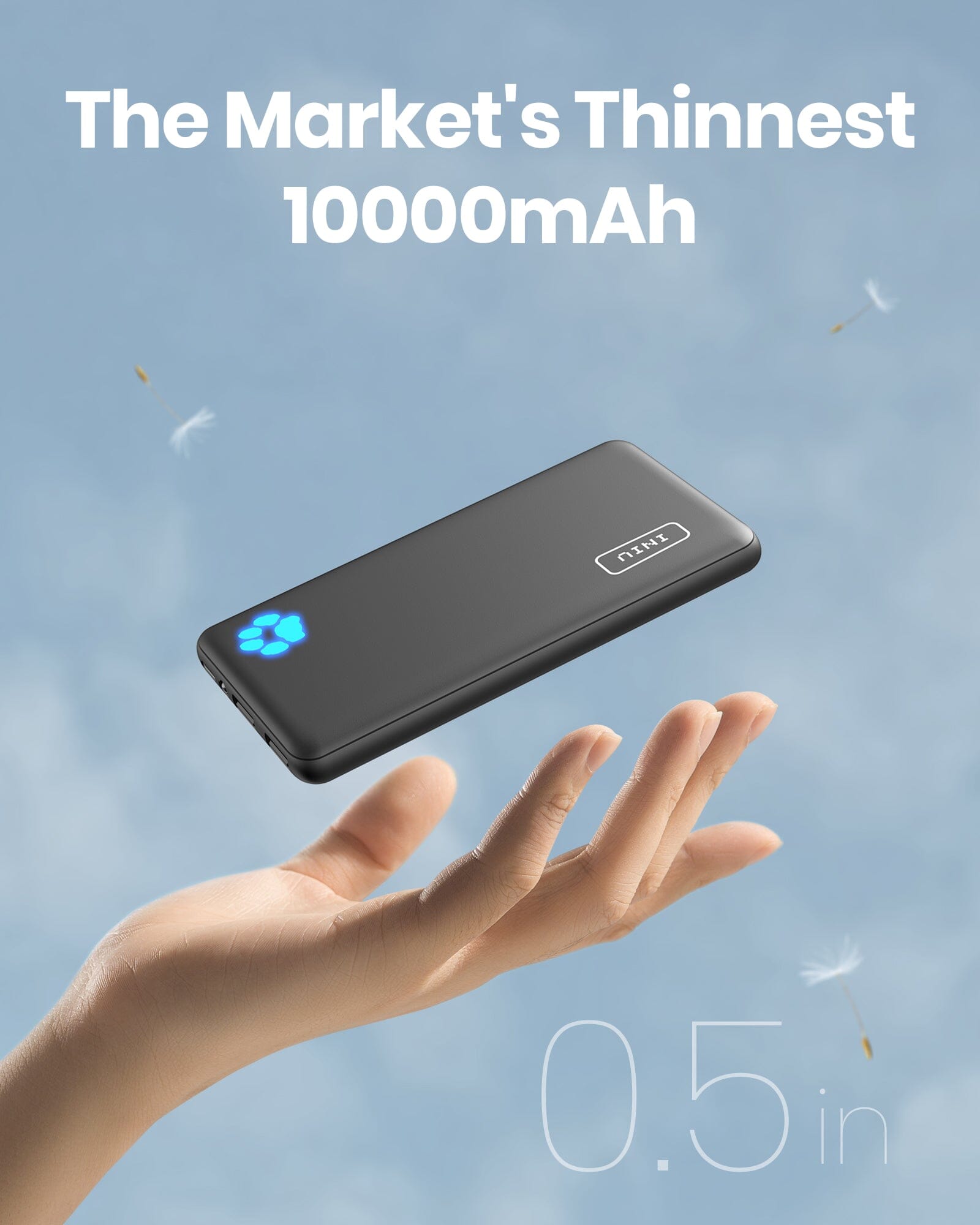 INIU B41 10000mAh power bank, slim black design, floating, sky background.