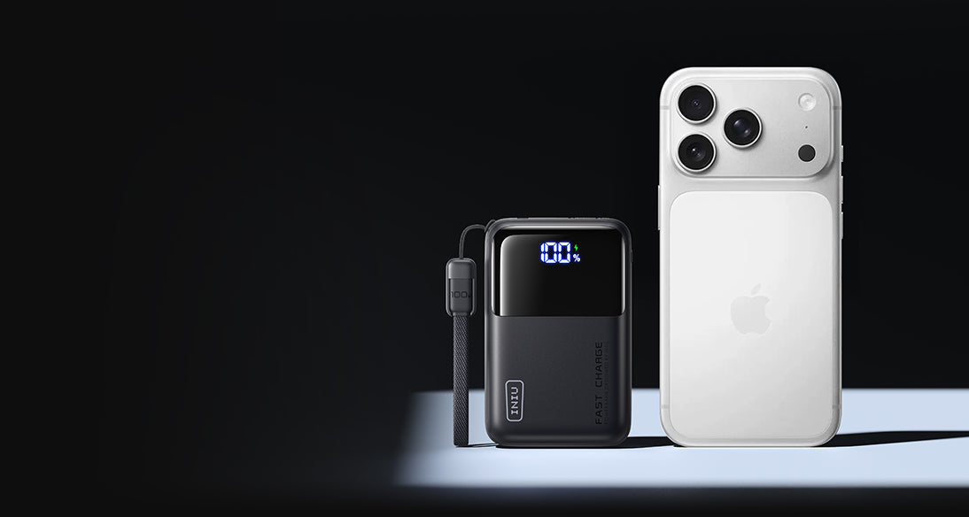 Mini power bank next to smartphone