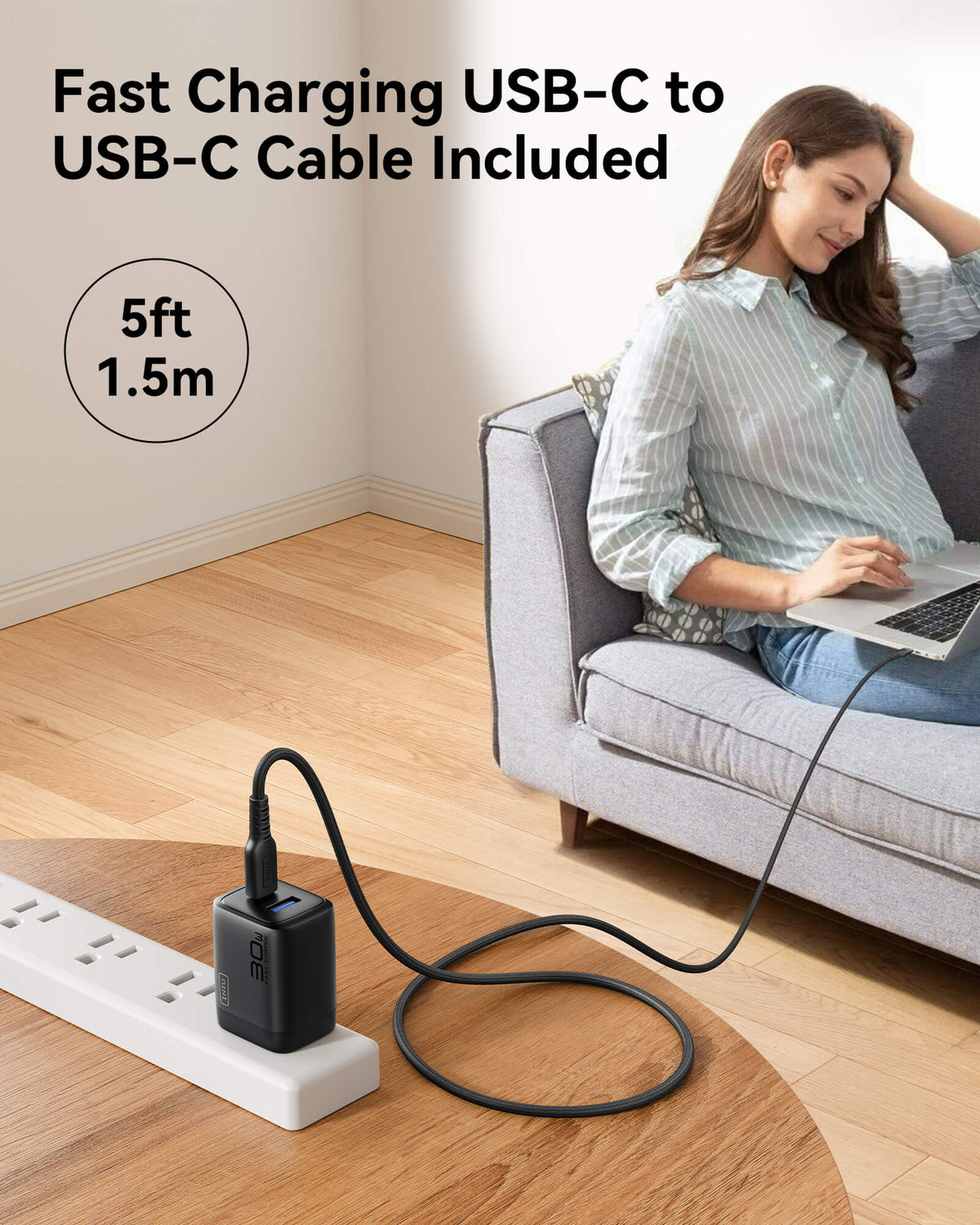 Black Friday deal: INIU 30W dual port charger with 5ft USB-C cable charging laptop on couch
