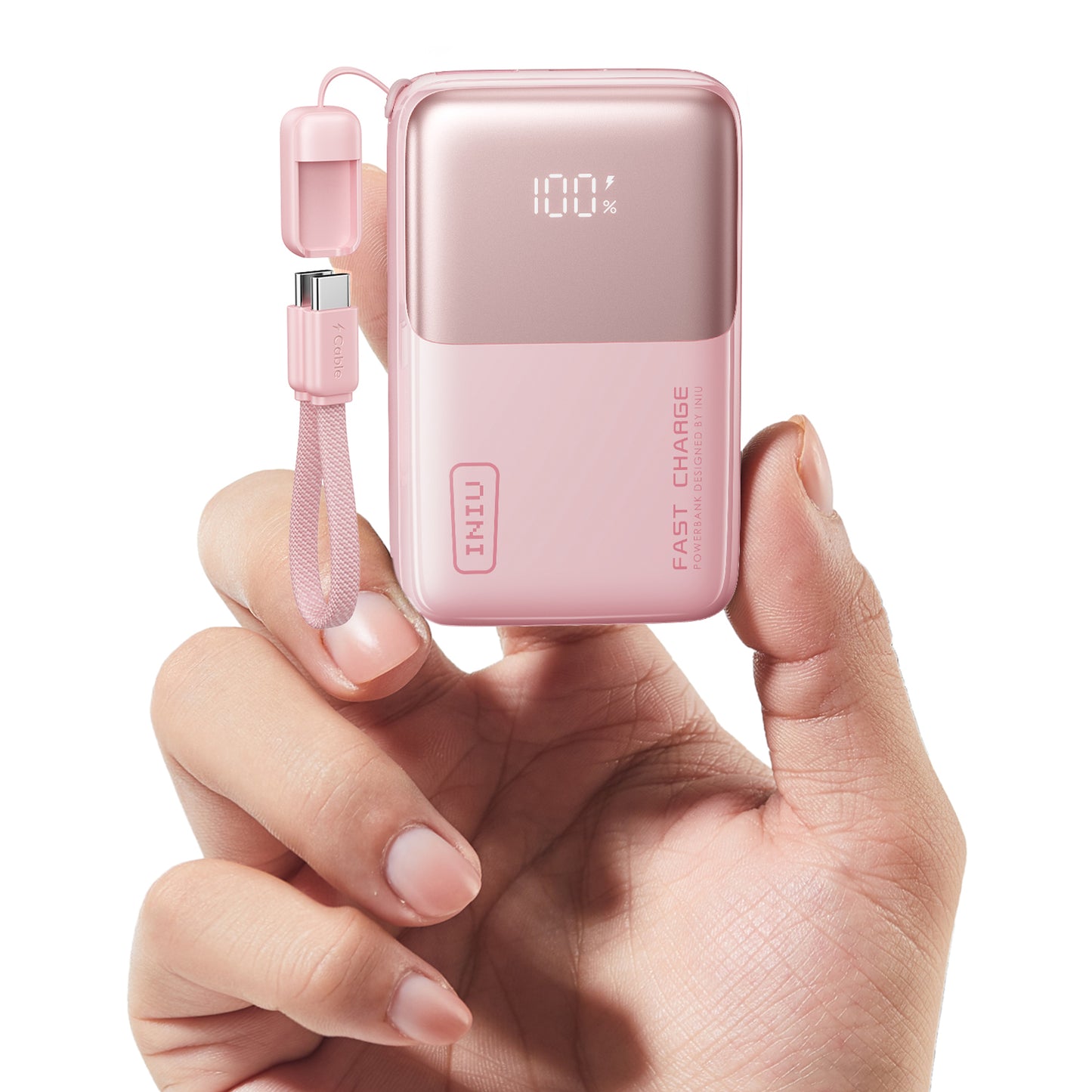 INIU P50 Power Bank: Light pink, fast charging, USB-C, compact design, and held in hand.